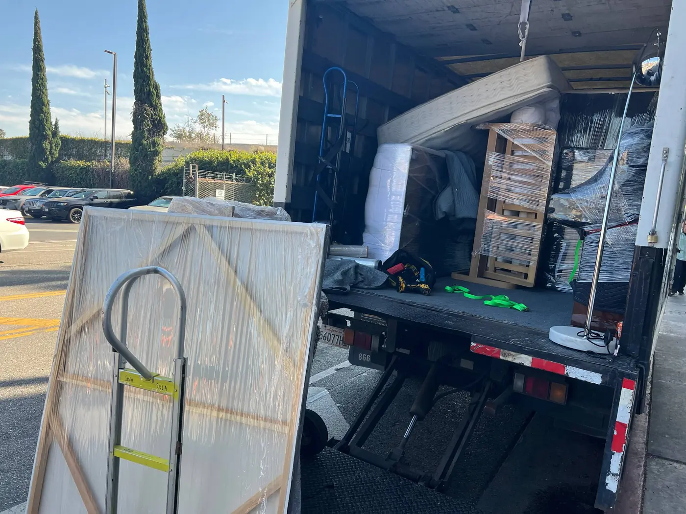 Valley Movers carefully wrapping household furniture